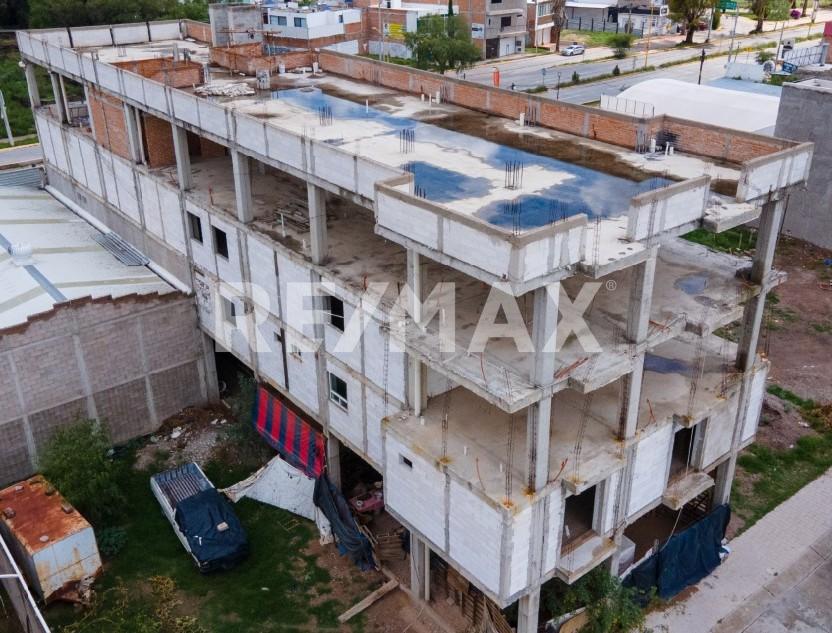 BUILDING UNDER CONSTRUCTION ON JUAN PABLO II